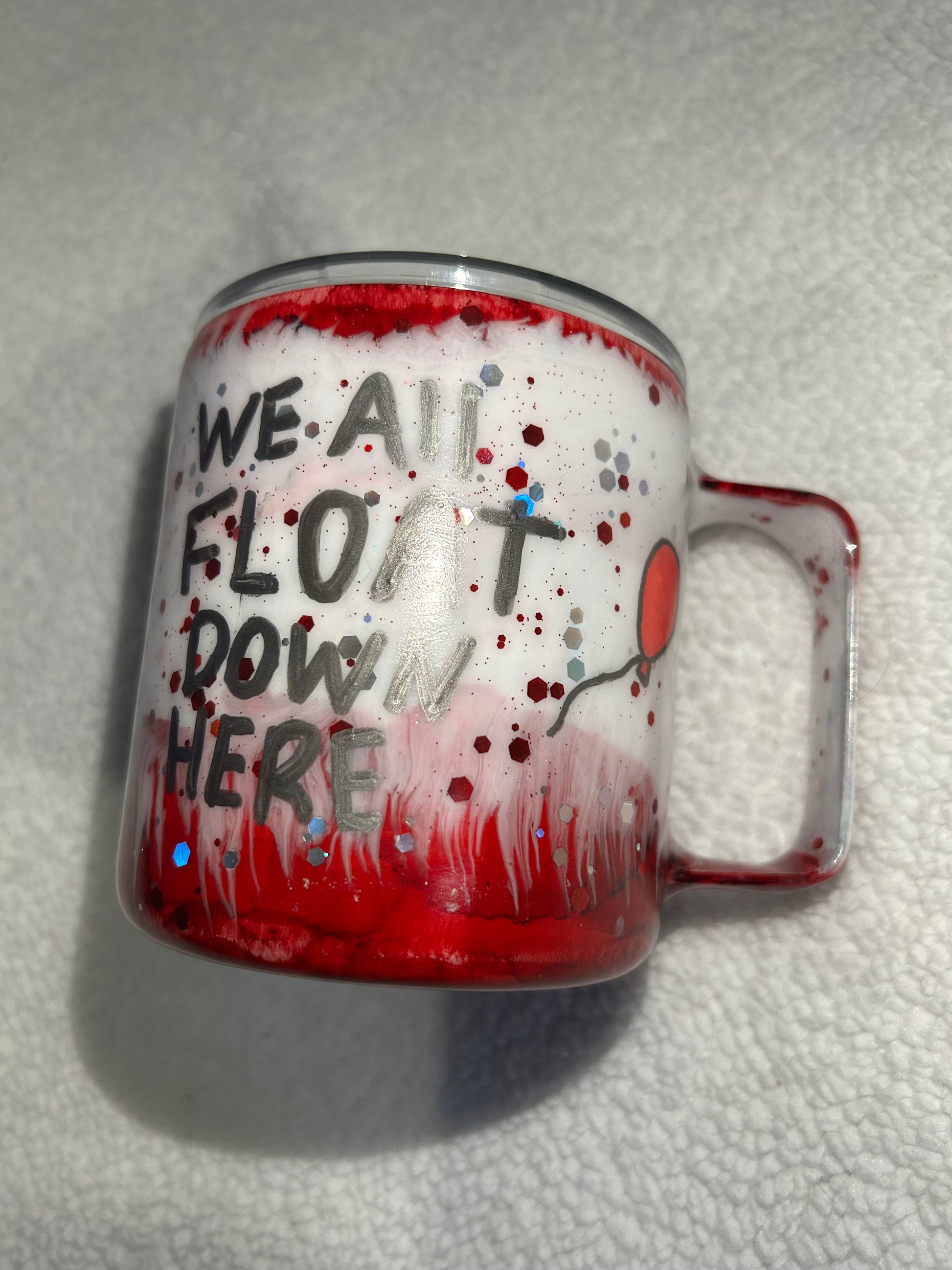 “We all float down here” mug tumbler